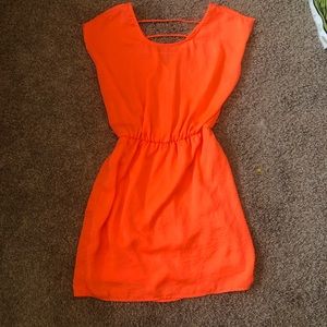 Bright Orange Charlotte Russe mini dress, cute back detailing size small.